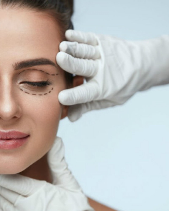 woman getting facial treatment consultation
