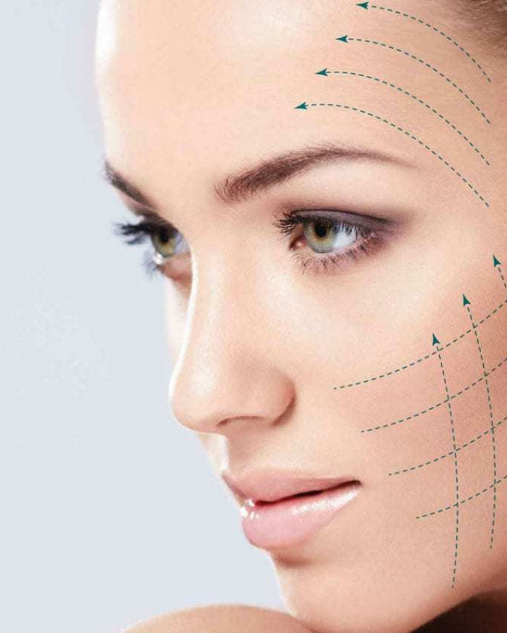 picture of a young woman with lifting contours on her face to illustrate what facial treatments can do