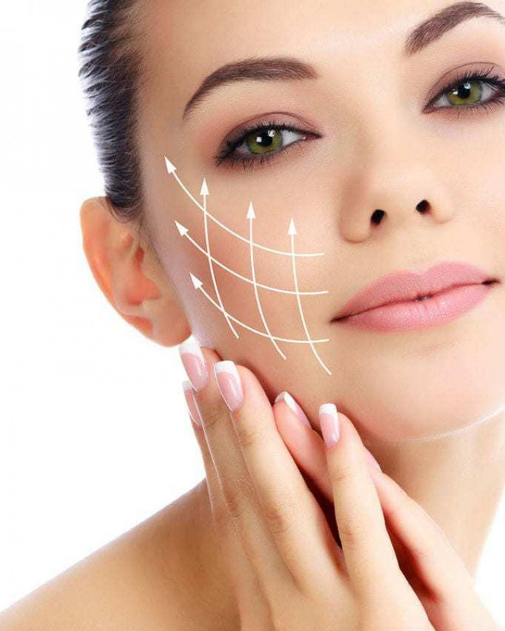 picture of a young woman with lifting contours on her face to illustrate what facial treatments can do