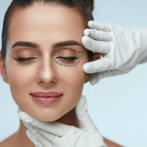 woman getting facial treatment consultation